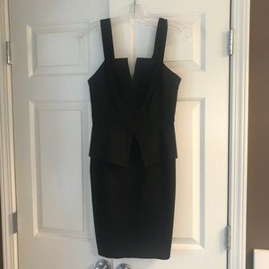 Black peplum cocktail dress